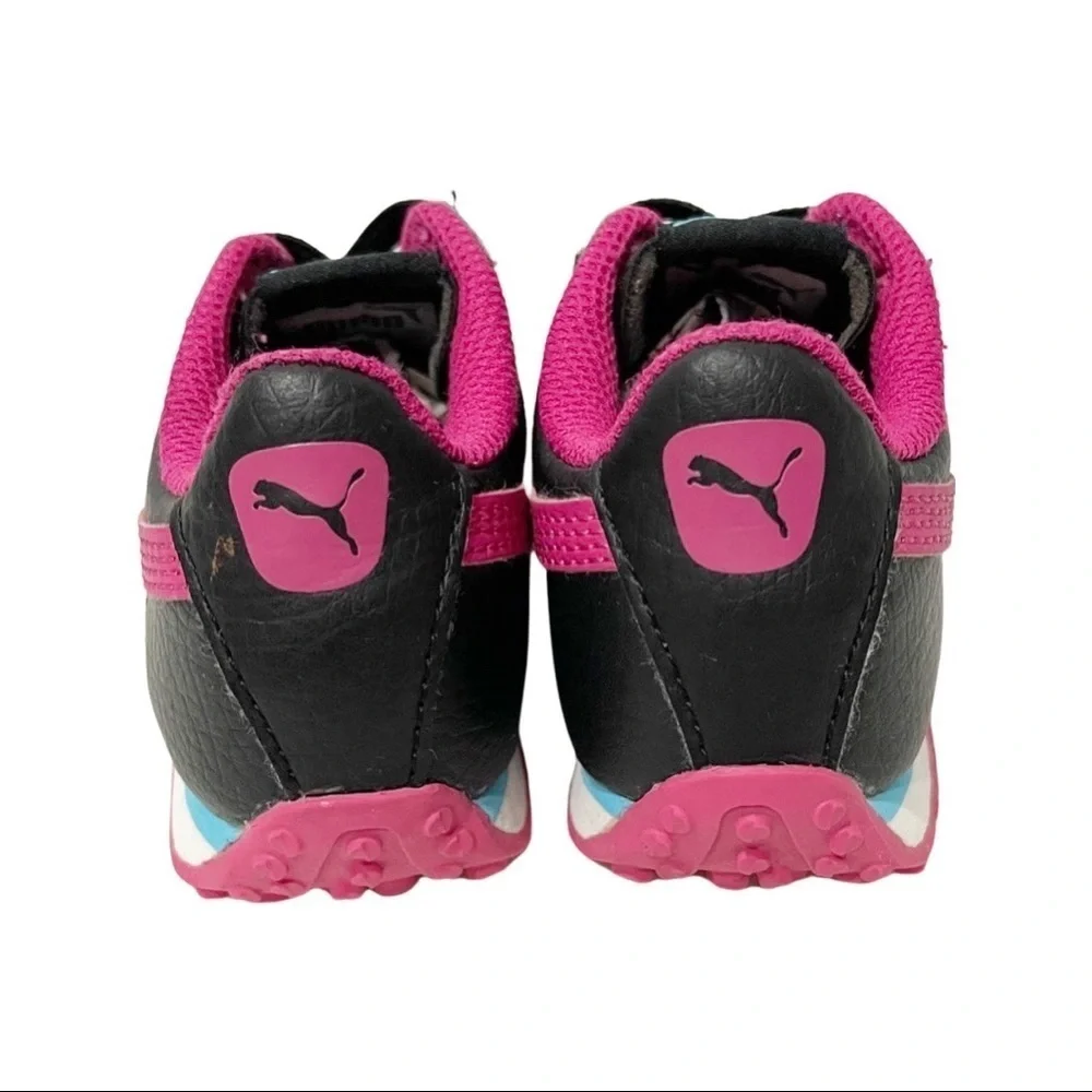 Puma Turin baby sneakers in black and hot pink color way. Size 6c